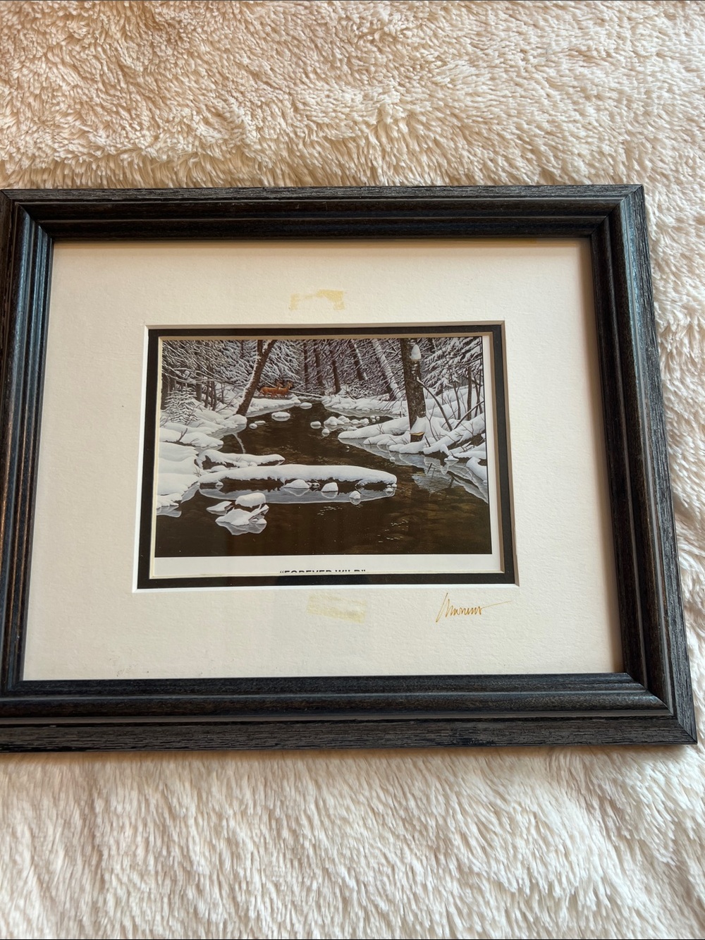 Snow-Covered Stream Art Print in Black Frame and White Mat